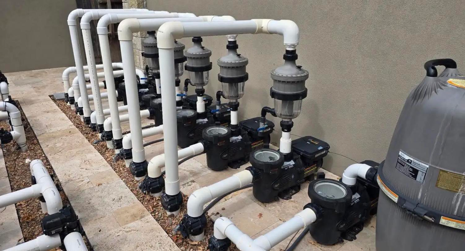 Commercial multi-pump and multi-filter bank with symmetrical PVC manifold